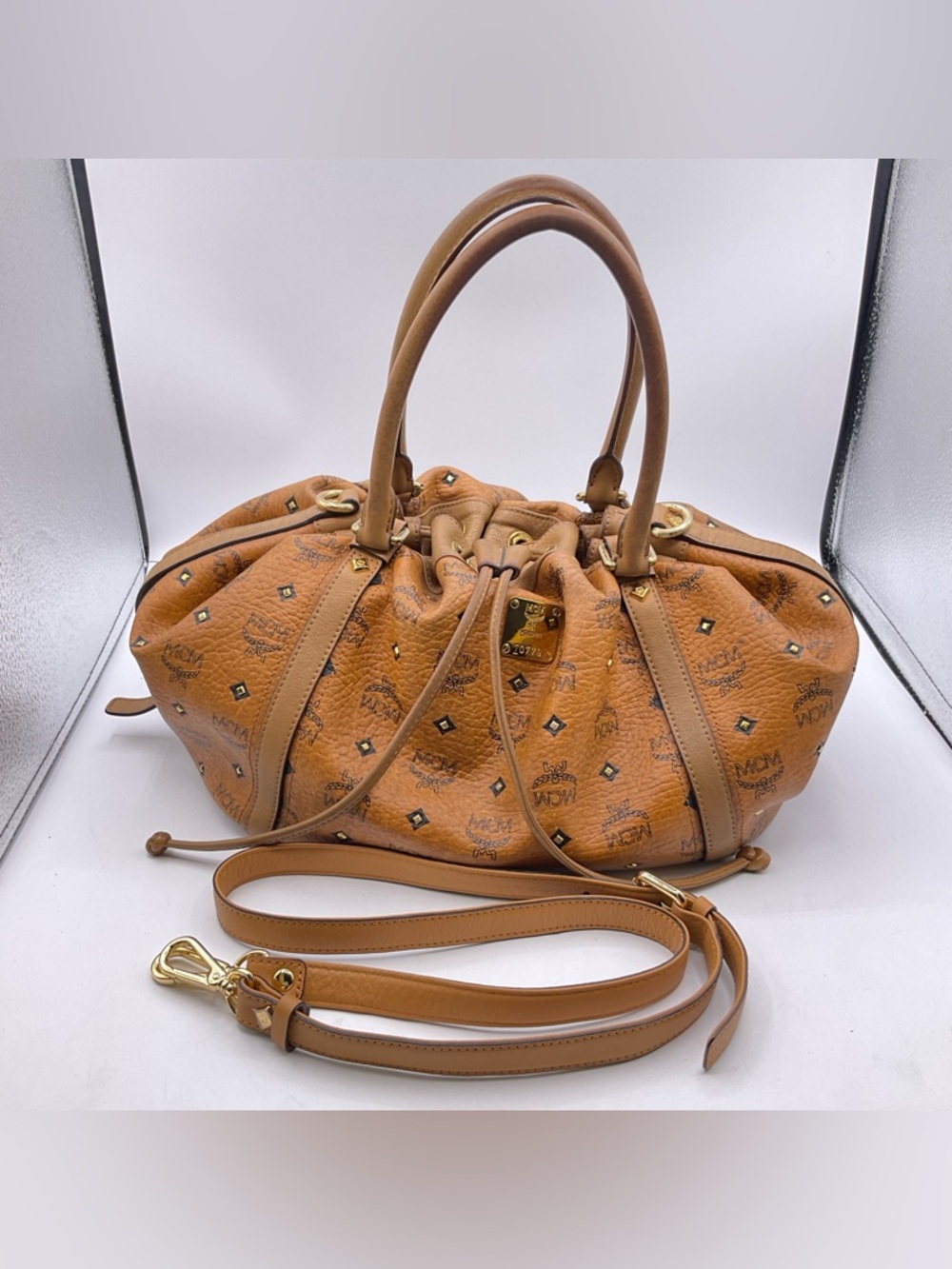 MCM Cognac Logo-Stamped Drawstring Shoulder Bag